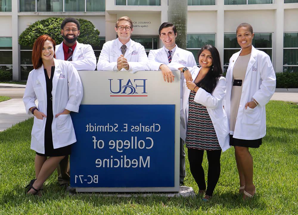 Medical students outside the Schmidt College of Medicine building on FAU Boca Raton campus